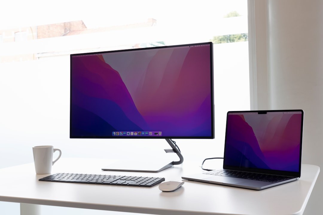 Editorial office desk with laptop, notebook and coffee cup